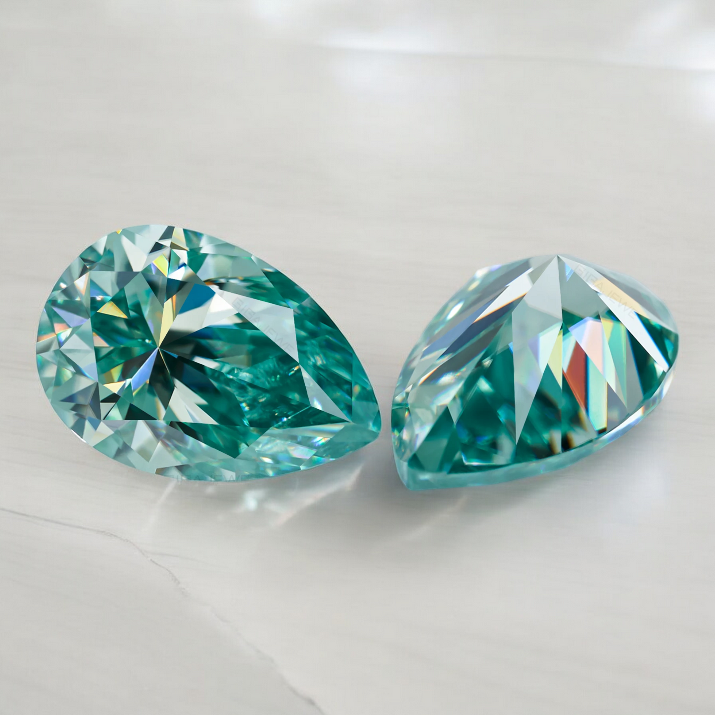 Bluish Green Pear Cut Moissanites