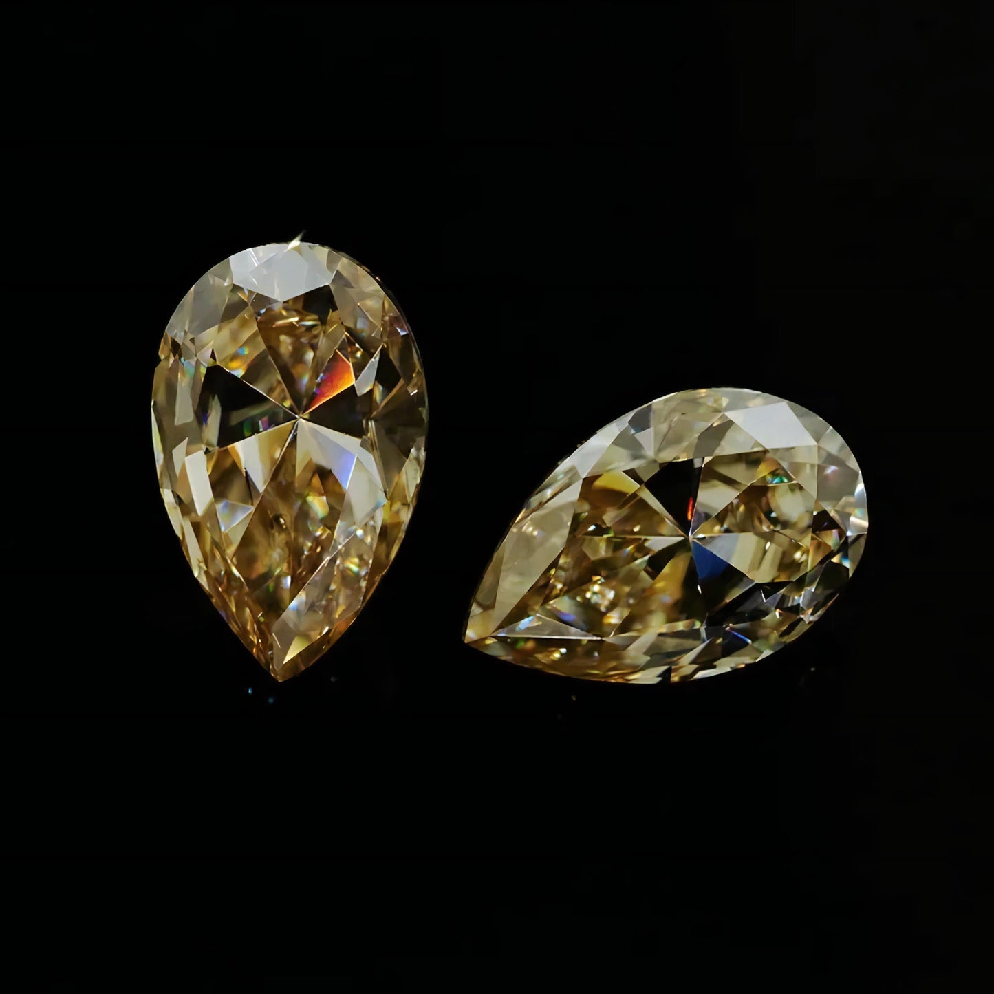 Vivid Champagne Pear Cut Moissanites